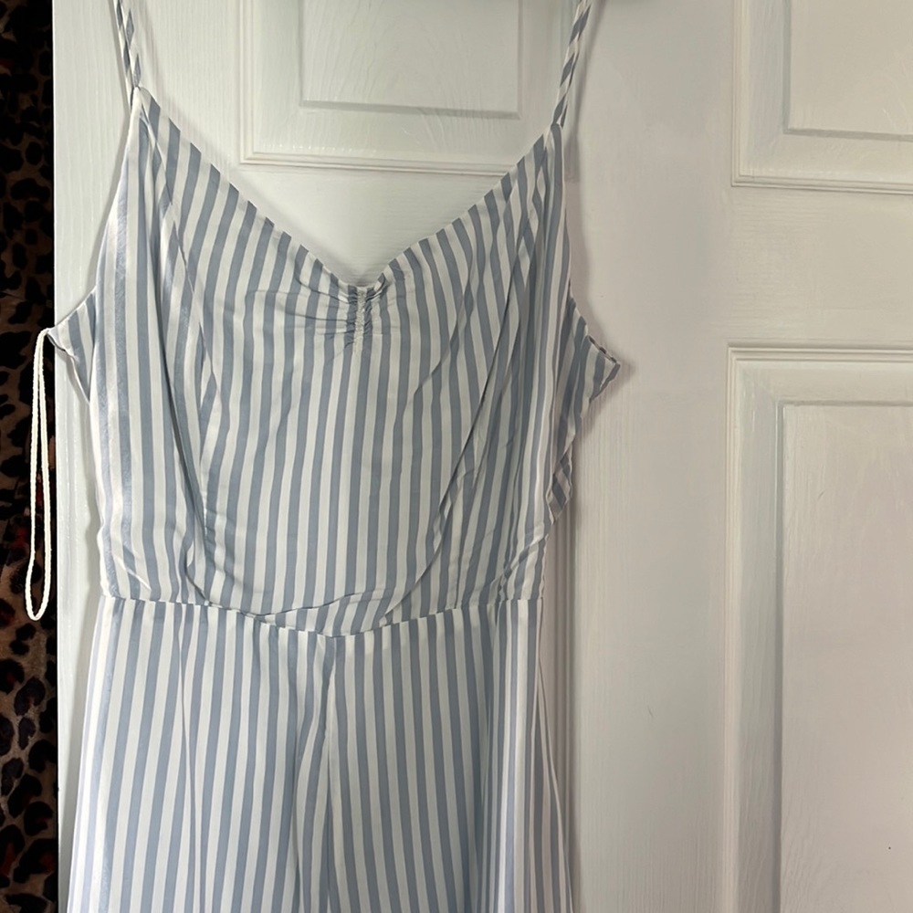 Brand new shorts romper. Open back. Tags still on